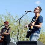 LAS VEGAS, NV - APRIL 01:  Musicians Stephen Barker (L) and Liles Eric Gunderson of Love and Theft perform onstage at the ACM Party For A Cause: Tailgate Party on April 1, 2017 in Las Vegas, Nevada.  (Photo by Rick Diamond/Getty Images for ACM)
