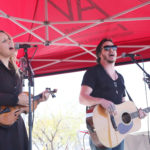 LAS VEGAS, NV - APRIL 01:  Musicians Jon Stone (L) and Kristy Osmunson of American Young perform onstage at the ACM Party For A Cause: Tailgate Party on April 1, 2017 in Las Vegas, Nevada.  (Photo by Gabe Ginsberg/Getty Images for ACM)